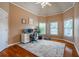 Bright home office with hardwood floors, natural light, and plenty of space for productivity at 5370 Newport Bay Psge, Alpharetta, GA 30005