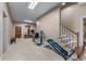 Spacious home gym providing a dedicated workout area with various fitness machines and ample room to exercise at 5945 W Andechs Smt, Johns Creek, GA 30097