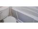 Bright bathroom featuring a pristine white toilet and a clean bathtub at 6366 Jasper Ct, Tucker, GA 30084