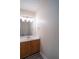 Bathroom featuring single sink vanity with a large mirror at 6366 Jasper Ct, Tucker, GA 30084