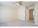 Bright bedroom featuring plush carpet and ample natural light at 6366 Jasper Ct, Tucker, GA 30084
