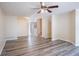 Spacious living room featuring modern flooring, neutral walls, and a ceiling fan for efficient climate control at 6366 Jasper Ct, Tucker, GA 30084