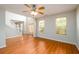 Spacious living room with hardwood floors, high ceilings, and abundant natural light at 1583 Rogers Crossing Dr, Lithonia, GA 30058