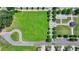 Aerial view showcases a community green space with trees and playground in a neighborhood at 1839 Kent Ave, Atlanta, GA 30338