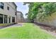 View of the backyard and exterior with patio at 1839 Kent Ave, Atlanta, GA 30338