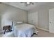 Neutral toned bedroom, with a comfortable bed, closet and bright windows allowing lots of light at 1839 Kent Ave, Atlanta, GA 30338