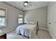 Neutral toned bedroom, with a comfortable bed, closet and bright windows allowing lots of light at 1839 Kent Ave, Atlanta, GA 30338