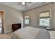 Neutral toned bedroom, with a comfortable bed, closet and bright windows allowing lots of light at 1839 Kent Ave, Atlanta, GA 30338