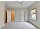 Bright bedroom with neutral walls, carpet, and two doorways at 1839 Kent Ave, Atlanta, GA 30338
