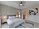 A bright and serene bedroom with a ceiling fan and plush area rug at 1839 Kent Ave, Atlanta, GA 30338