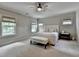 Bedroom with neutral colors, carpet and bench at 1839 Kent Ave, Atlanta, GA 30338