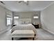 Bedroom with neutral colors, carpet and bench seating at 1839 Kent Ave, Atlanta, GA 30338