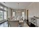 Bright dining room featuring a chandelier, large window, and a table set for a meal at 1839 Kent Ave, Atlanta, GA 30338