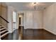 A hallway area with hardwood floors and a staircase at 1839 Kent Ave, Atlanta, GA 30338