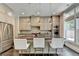 Well-lit kitchen featuring a large island, stainless steel appliances, and plenty of cabinet space at 1839 Kent Ave, Atlanta, GA 30338