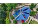 Overhead view of a colorful playground featuring sunshades and surrounding landscape at 1839 Kent Ave, Atlanta, GA 30338