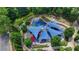 Aerial shot of a shaded playground area surrounded by lush green trees at 1839 Kent Ave, Atlanta, GA 30338