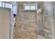 The tiled shower features a built-in toiletry nook and window at 1839 Kent Ave, Atlanta, GA 30338