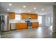 This updated kitchen features modern appliances, ample cabinetry, and stylish flooring at 320 White Birch Dr, Covington, GA 30016
