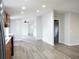 Bright living room showcases sleek flooring and neutral wall colors for a modern appeal at 320 White Birch Dr, Covington, GA 30016