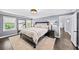 Comfortable bedroom with stylish furniture and plenty of natural light at 7590 Chaparral Dr, Atlanta, GA 30350