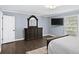 Comfortable bedroom featuring TV, stylish decor, and plenty of natural light at 7590 Chaparral Dr, Atlanta, GA 30350