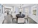 Eat-in kitchen with breakfast nook, white wainscoting and large window at 7590 Chaparral Dr, Atlanta, GA 30350