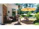 Outdoor patio with comfortable seating, patio heater and view of pool at 7590 Chaparral Dr, Atlanta, GA 30350
