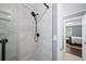 Modern shower with updated tile and black fixtures at 7590 Chaparral Dr, Atlanta, GA 30350