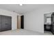 A bright bedroom with gray color doors and an open bathroom, creating a serene retreat at 136 Beutell St, Norcross, GA 30071