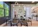 Stylish dining room with modern decor, large window, and elegant light fixture that offers a comfortable feel at 136 Beutell St, Norcross, GA 30071