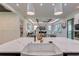 Gourmet kitchen with island sink and faucet, opening into a living room for easy entertaining at 136 Beutell St, Norcross, GA 30071