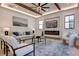 Open living room with modern fireplace, recessed lighting and elegant decor for a welcoming atmosphere at 136 Beutell St, Norcross, GA 30071