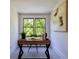 Cozy office space with a wooden desk, natural light from the windows, and modern decor at 136 Beutell St, Norcross, GA 30071