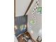 Modern staircase design with wood treads, stylish lighting, and views from multiple windows at 136 Beutell St, Norcross, GA 30071