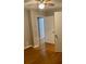 Neutral bedroom with hardwood floors and an open doorway leading to another room at 1607 Hillview, Jonesboro, GA 30236