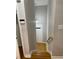 Entryway featuring hardwood stairs leading to the main level, a pendant light, and neutral paint at 1607 Hillview, Jonesboro, GA 30236