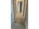 Hallway with light gray tile floors and a white door at 1607 Hillview, Jonesboro, GA 30236