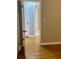 Hallway with hardwood floors, and white trim at 1607 Hillview, Jonesboro, GA 30236