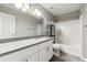Bathroom featuring a large vanity, quartz countertop, and a shower-tub combo at 2994 Meadow Church Rd, Suwanee, GA 30024
