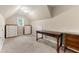 Upstairs bedroom features carpeted floors and a window at 2994 Meadow Church Rd, Suwanee, GA 30024