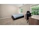 Bedroom showcasing lots of natural light and neutral colored walls at 2994 Meadow Church Rd, Suwanee, GA 30024
