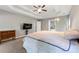 Spacious main bedroom features a tray ceiling and has an adjoining bath at 2994 Meadow Church Rd, Suwanee, GA 30024