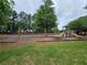 Community playground featuring swings and slides for enjoyment at 2994 Meadow Church Rd, Suwanee, GA 30024