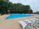 Community swimming pool with lounge chairs for relaxation and summer fun at 2994 Meadow Church Rd, Suwanee, GA 30024