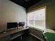 A bright home office offers a dedicated workspace for productivity and focus at 3784 The Great Dr, Atlanta, GA 30349