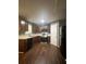 Well-lit kitchen featuring wood cabinets and stainless steel appliances at 3953 Cress Way Run, Decatur, GA 30034