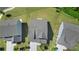 A beautiful community is seen from above with the roofs and green lawn creating a park like view at 803 Levi Farms Ln, Canton, GA 30115