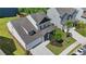 Aerial view of a two-story home featuring a well-maintained yard, two-car garage and neat landscaping at 803 Levi Farms Ln, Canton, GA 30115