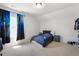 This bedroom boasts bright natural light and unique curtains at 803 Levi Farm Ln, Canton, GA 30115
